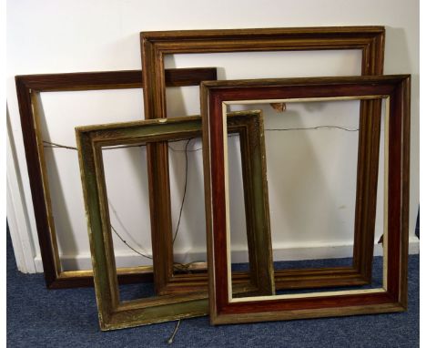 A group of seven antique and vintage picture frames, in various sizes, including a gilt example, a green and gilt painted fra