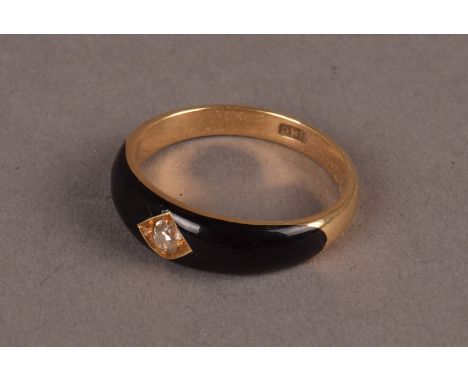 A fine Victorian period 18ct gold black enamel and diamond mourning style ring, the tapered band having black enamel to front
