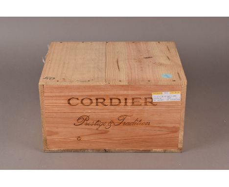 A case of 6 bottles of Chateau Tanesse Cotes de Bordeaux Rouge 1998, this red Bordeaux is presented in its original wooden bo