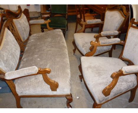 A 19th century parlour suite, comprising a two seat sofa and two arm chairs (3) 