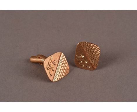 A pair of 9ct gold cufflinks, having engine turned oblong panels engraved with initials JH, approx 7.6g (2) 