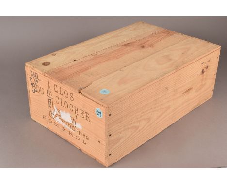 A case of 12 bottles of Clos du Clocher Pomerol 1982, this red Bordeaux is presented in its original wooden box (12) 