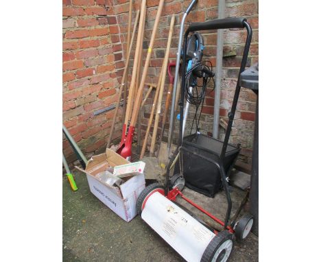 A quantity of garden tools to include post hole digger, electrical strimmer, Eckman push mower 