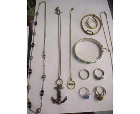 Costume jewellery, a small quantity of British coinage to include six silver threepenny coins, a yellow metal diamond engagem