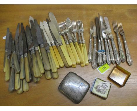 White metal and monogrammed knives and forks A/F, together with early to mid 20th century cutlery and flatware, a silver ciga