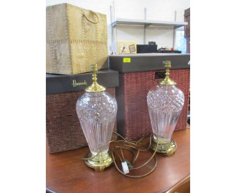 A pair of Waterford cut crystal glass and brass table lamps together with two Harrods hamper boxes and another 