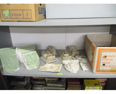 A group of vintage plaster corbels and capitals, and other architectural plaster work 