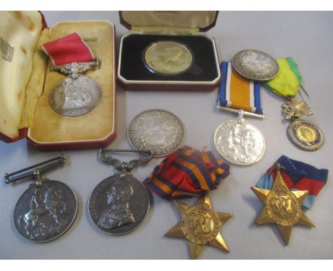 A selection of British and other medals to include a Meritorious Service medal inscribed Gordon Wilkins1914 - 1918 British Wa