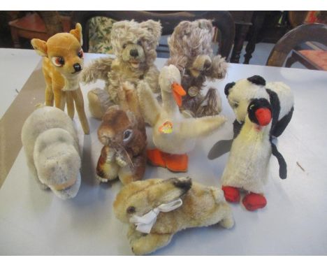 A selection of Steiff animals to include a penguin, Perri the squirrel, Mockie the hippo and other together with two Hermann 