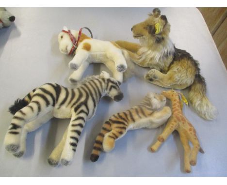 A selection of Steiff animals to include a collie dog, giraffe, zebra and others 