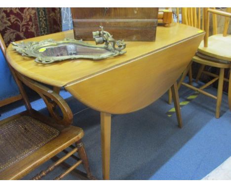 Light elm and beech fall flap table, possibly by Ercol, together with  set of four Ercol style hoop back chairs 