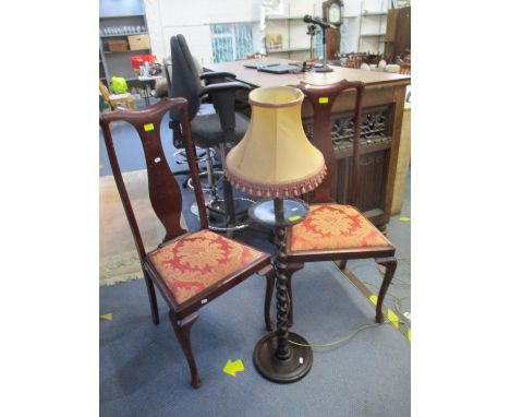 An early 20th century mahogany display cabinet, extended back with central flower head design, twin astragal glazed doors rev