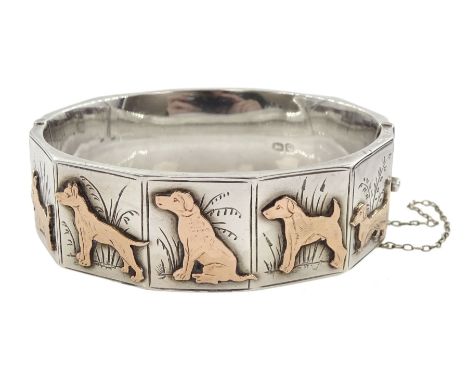 Early - mid 20th century silver dog bangle, five panels with applied rose gold dogs including West Highland Terrier, Labrador
