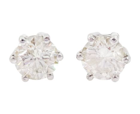 Pair of 18ct gold round brilliant cut diamond stud earrings, total diamond weight approx 1.50 caratCondition Report:Diamonds 