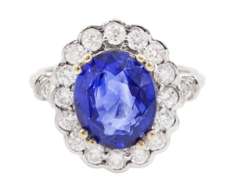 18ct white gold oval cut sapphire and round brilliant cut diamond cluster ring, sapphire approx 3.05 caratCondition Report:Ap