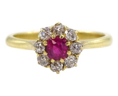 Early 20th century ruby and old cut diamond cluster ring, stamped 18ctCondition Report:Approx 2.5gm, size K-L, head diameter 
