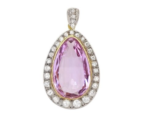 18ct gold Brazilian pink topaz and round brilliant cut diamond pendant, the milgrain set pear cut topaz of 8.80 carat, with g