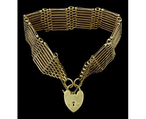 9ct gold nine bar gate bracelet, with heart locket clasp, hallmarkedCondition Report:Approx 31.2gm, good condition