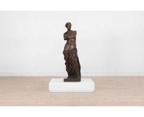 A patinated bronze figure after the antique, 19th century, French, 'The Venus de Milo', inscribed 'Sauvage' to the base, 29cm