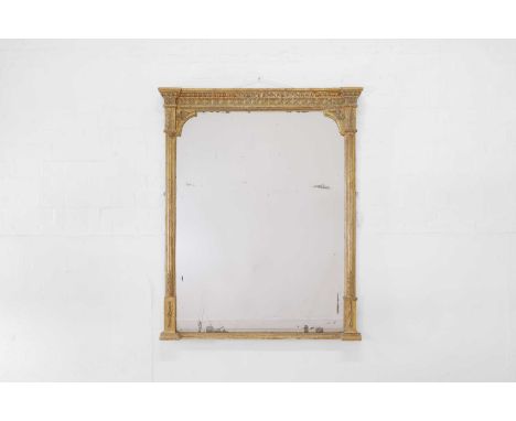 A carved giltwood and gesso overmantel mirror, 19th century, of architectural form, the glass plate flanked by a pair of leaf