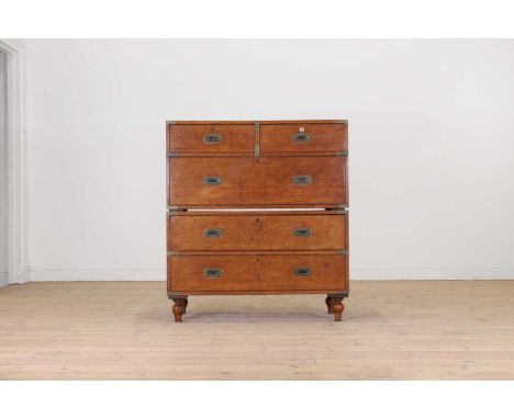 A Victorian oak campaign chest, second half of the 19th century, of typical form, raised on bun feet,99cm wide45cm deep110cm 