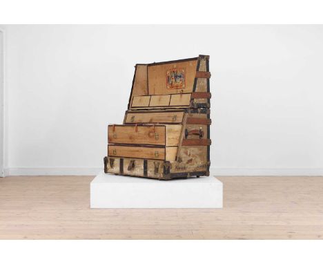 A canvas and metal-mounted steamer cabin trunk, early 20th century, with a fitted interior,88cm wide54cm deep110cm high when 