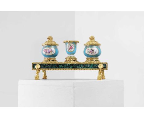 A malachite, porcelain and ormolu inkstand, 19th century, French, with Sèvres-style inkwells and drip pot painted with floral