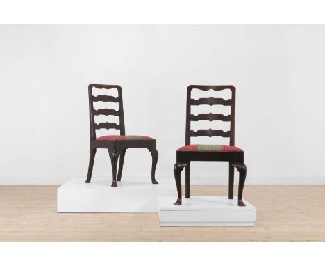 A pair of George II mahogany ladder-back side chairs, second quarter of the 18th century, each with striped-upholstered seats