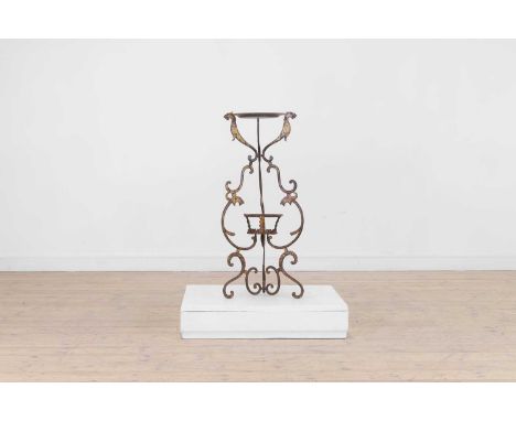 A gilt-japanned wrought-iron torchère stand, 19th century, of tripod form with scrolling chinoiserie detail and supports in t