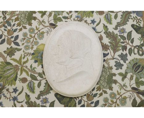 Thomas Woolner RA (1825-1892), a carved white marble portrait medallion of a woman in profile, signed 'T. Woolner. SC. 1868',