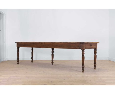 A Victorian oak kitchen table, 19th century, the cleated plank top above two end drawers, raised on turned supports, 268cm wi