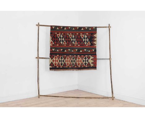 A Shirvan flat-weave kilim rug, late 19th/early 20th century, Caucasus, woven in polychrome-banded diamonds and zigzags with 
