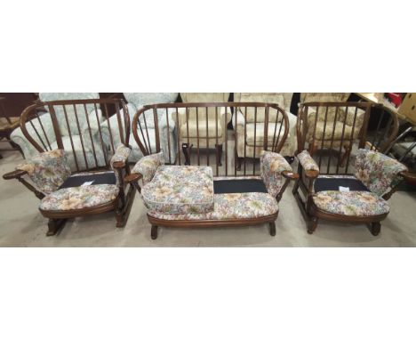 An Ercol style 4 piece cottage suite with wooden frames and floral tapestry upholstery, comprising 2 seater settee, pair of a