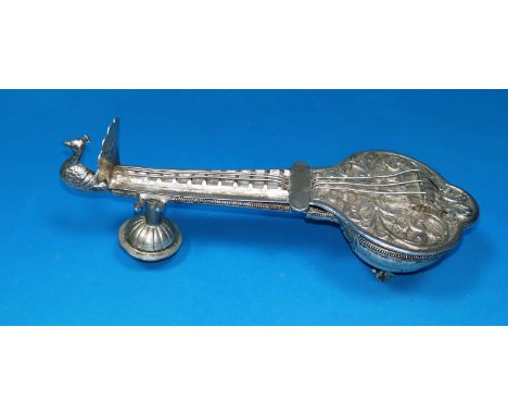 An Indian white metal trinket box in the form a sitar with peacock finial, 5.83oz. 