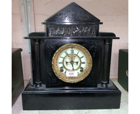 A 19th century mantel clock in black marble architectural case, with visible escapement and French striking movement 