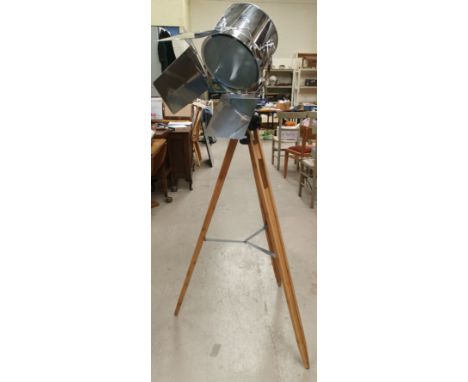 A reproduction 'set light' on tripod base