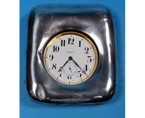 A large travelling clock/pocket watch in silver mounted case 