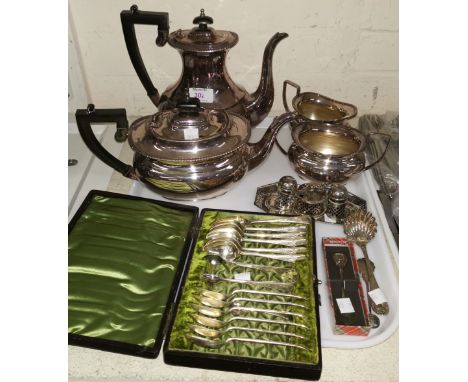 An EPNS Regency style  4 piece tea service by Garrard; a set of similar spoons; a cruet; etc. 