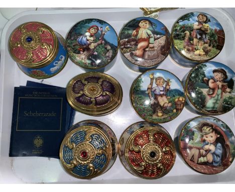 Thirteen decorative china musical trinket boxes, including Hummel, Limited Edition music box collection, etc.; a carving set 