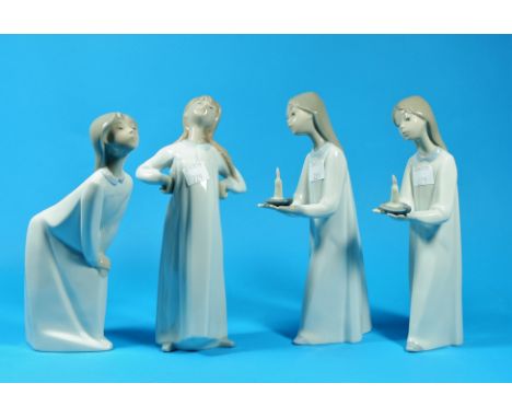 Three Lladro and a Nao figure of children in night attire 