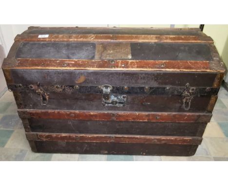 A 19th century  wood bound dome top cabin trunk 