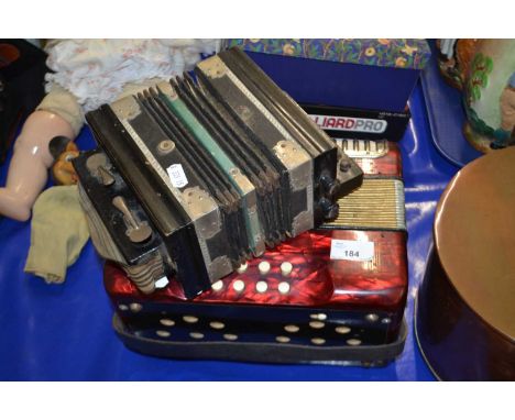 Vintage Hohner Erica accordion together with a further smaller example