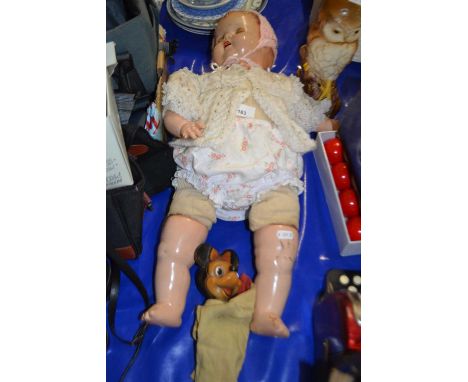 Vintage doll with composition head and limbs together with a vintage Minnie Mouse glove puppet