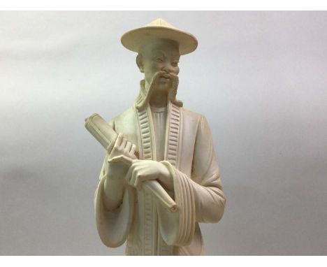 PAIR OF CHINESE RESIN FIGURES one modelled as a male holding a scroll, the other modelled as a lady holding a fan, each on ci