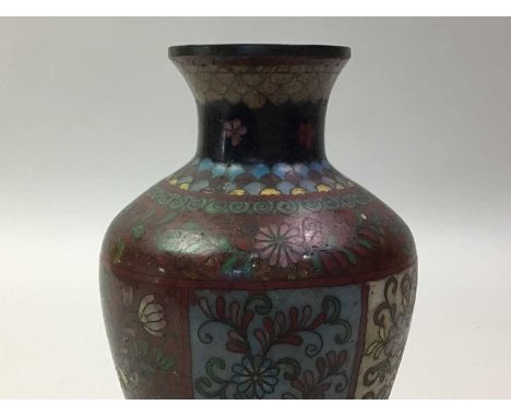 PAIR OF CLOISONNE VASES AND A CHINESE CERAMIC FIGURE the cloisonne vases decorated with flowers, of tapared form, along withy