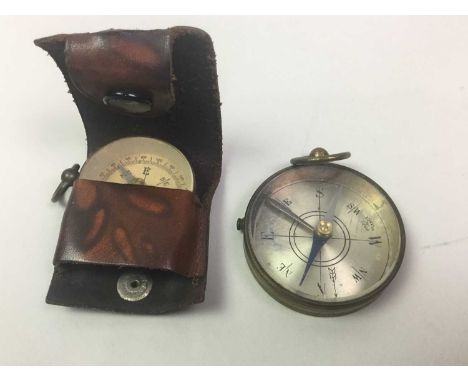 TWO POCKET COMPASSES ALONG WITH COINS AND MEDALS one compass in fitted case