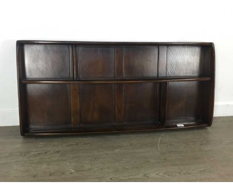 ERCOL OAK PLATE DISPLAY RACK, LATE 20TH CENTURY  wall mounting107cm wide 