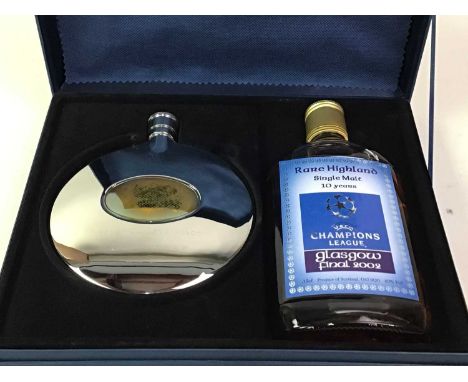 CHAMPIONS LEAGUE FINAL 2002, WHISKY GIFT SET AND PROGRAMME the set comprising a Highland single malt 35cl and hipflask, the p