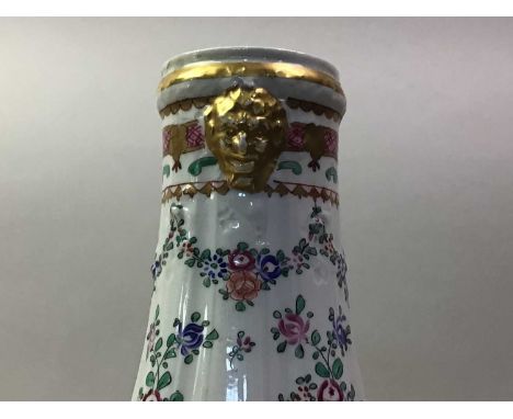 SAMSON OF PARIS CERAMIC VASE, painted with flowers and fixed to a gilded metal base33cm high Some gilding rubbing off some ar