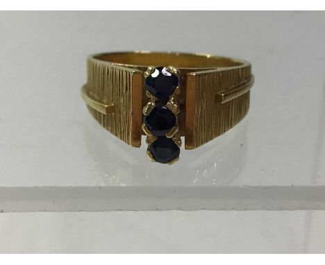 SAPPHIRE DRESS RING, C.1970S set in gold, marks indistinctQty: 6.26gRing size M the setting is 9.5mm x 3.2 mm